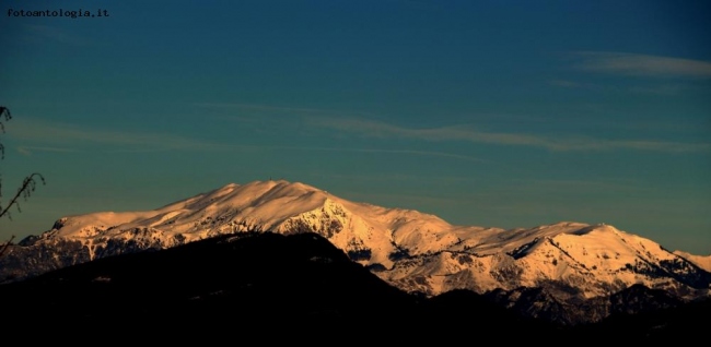 ... cime innevate al tramonto