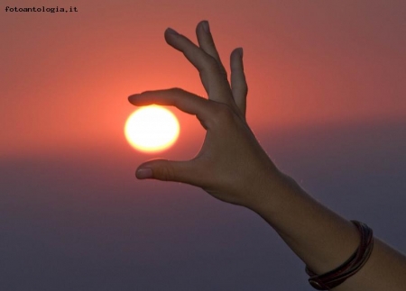 Tramonto in mano