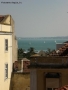 Prossima Foto: il mare tra i tetti